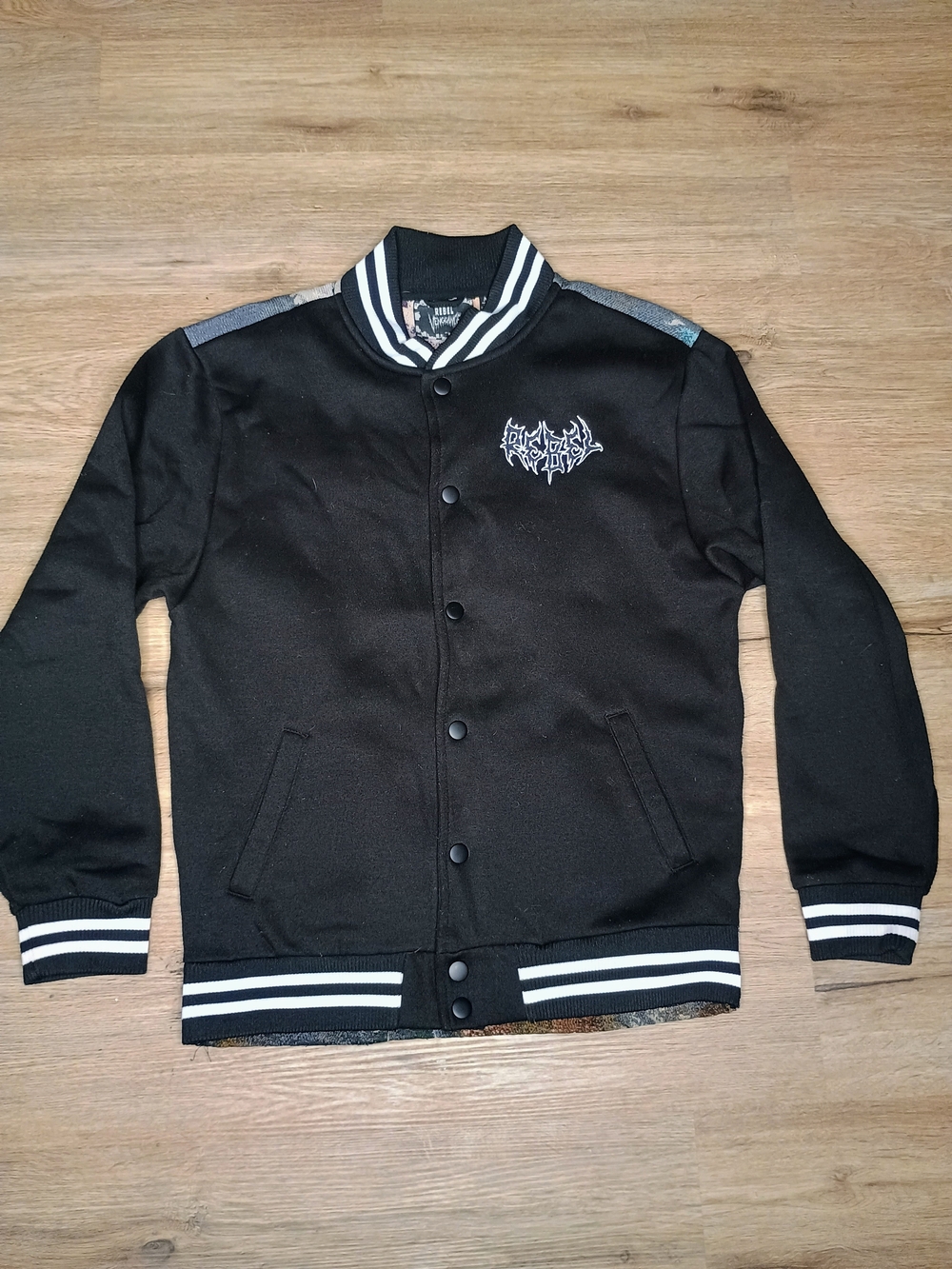 rebels Black Bomber-Style Varsity Jacket with White Trim